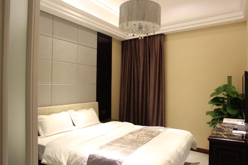 Junfu Hotell Guangzhou Rum bild